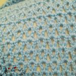 Gola de crochet azul, torcida