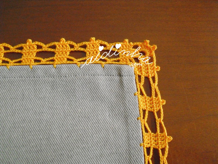 crochet laranja do pano com barra cinzenta